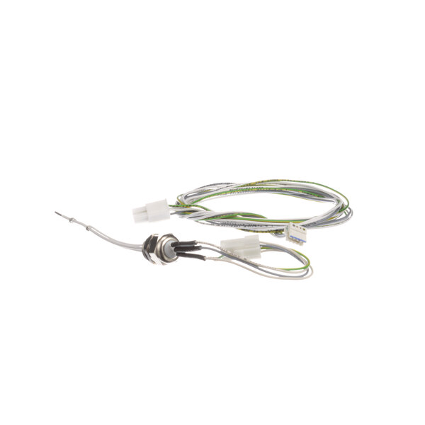 A white wire with a green connector on a Rational filling-level electrode.
