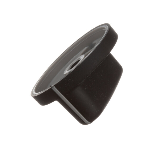 A close-up of a black plastic Hobart mixer knob with a hole in the center.
