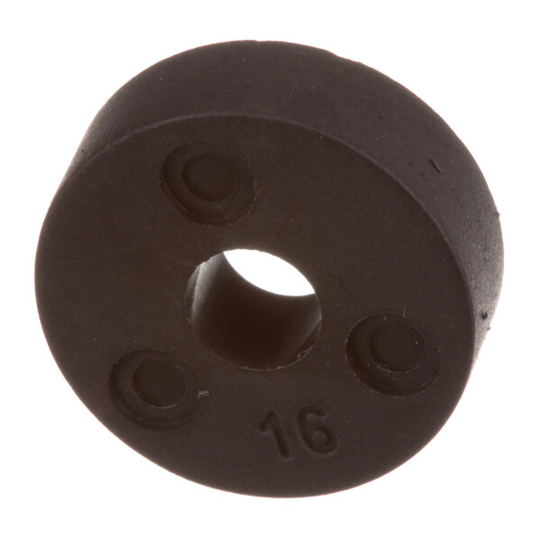 A black round rubber magnet with 16 holes.