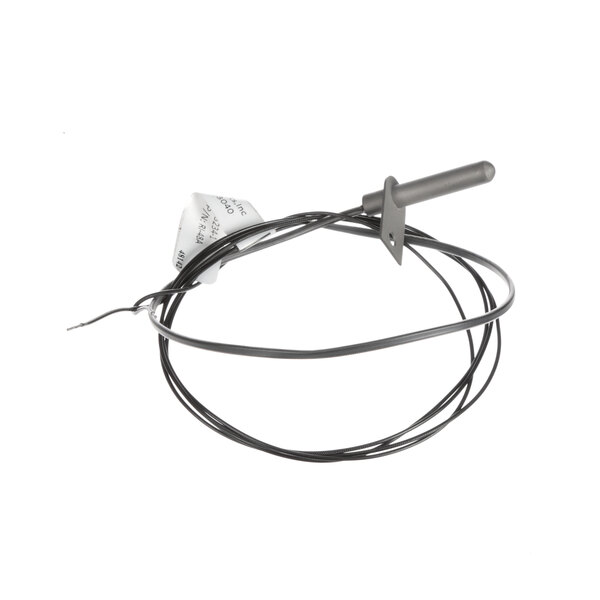 A wire with a metal handle and a black and white reed switch.
