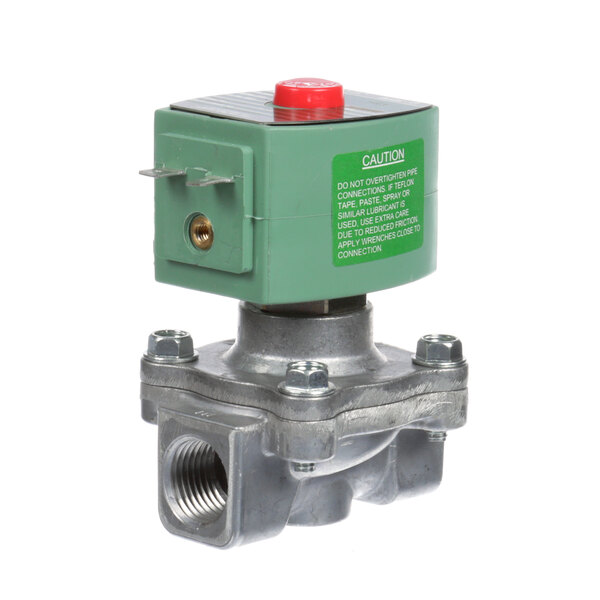 An Accutemp gas valve with a green and silver metal body and a red button.