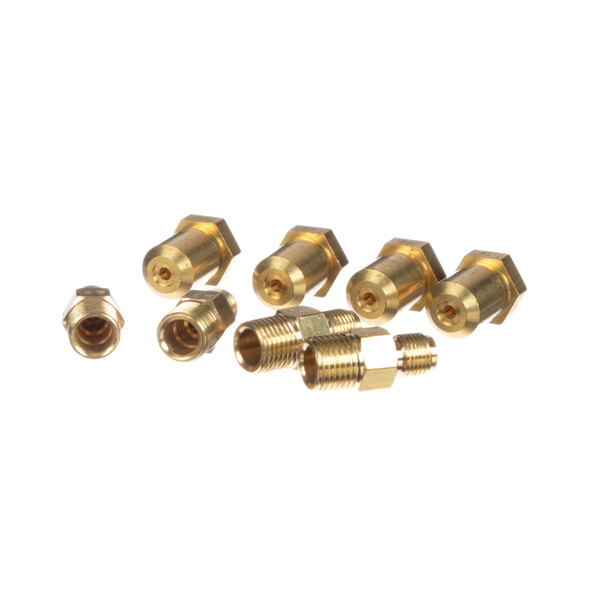A group of brass threaded fittings.