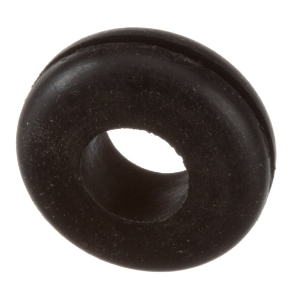A close-up of a black rubber grommet with a hole in it.