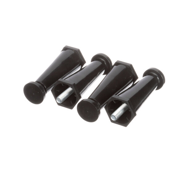A close-up of a group of black plastic pegs.