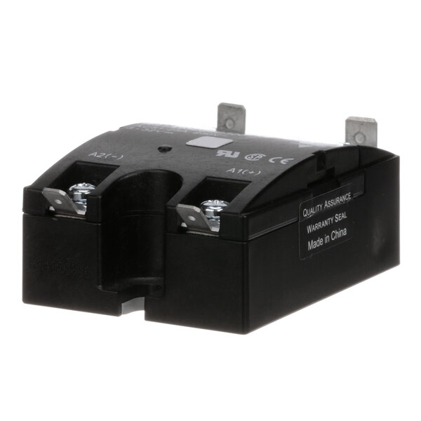A black electrical relay with metal screws.