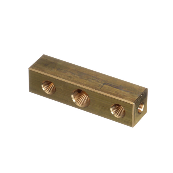 A brass metal Franke pressure block.