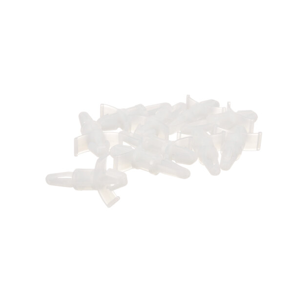 A pile of white plastic clips.