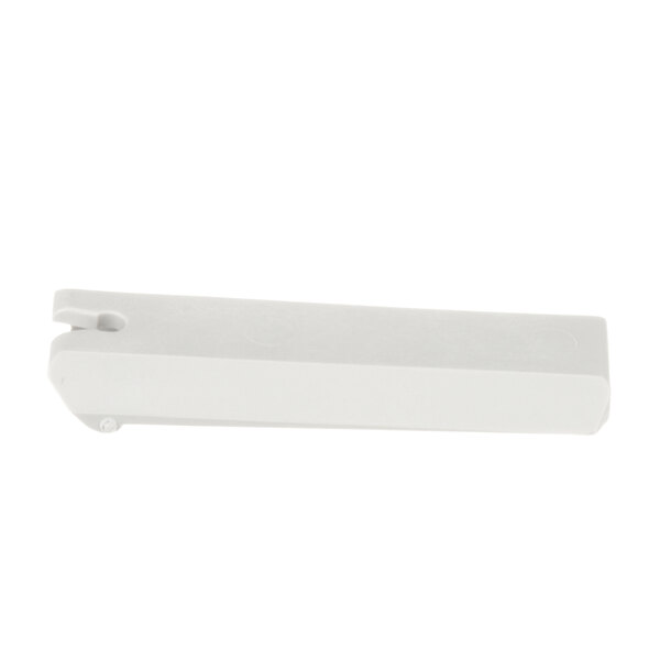A white plastic valve jaw for a Silver King refrigerated beverage dispenser.