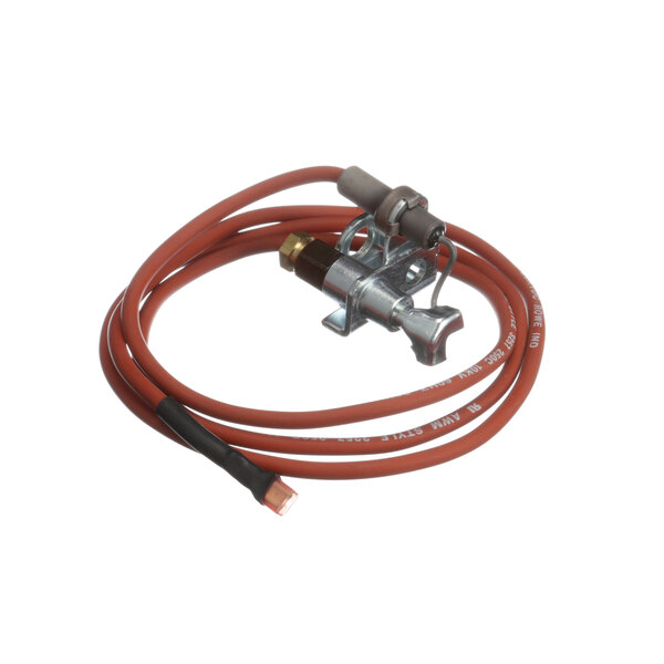 A Groen pilot assembly with a red hose and orange wire attached to it.