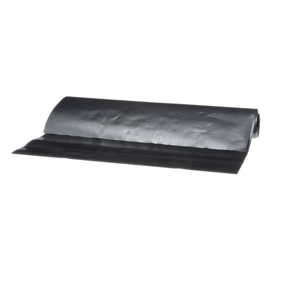 A roll of black plastic release sheets.