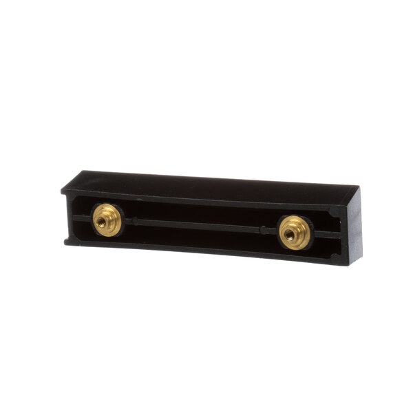 A black metal handle assembly with gold metal knobs on a counter.