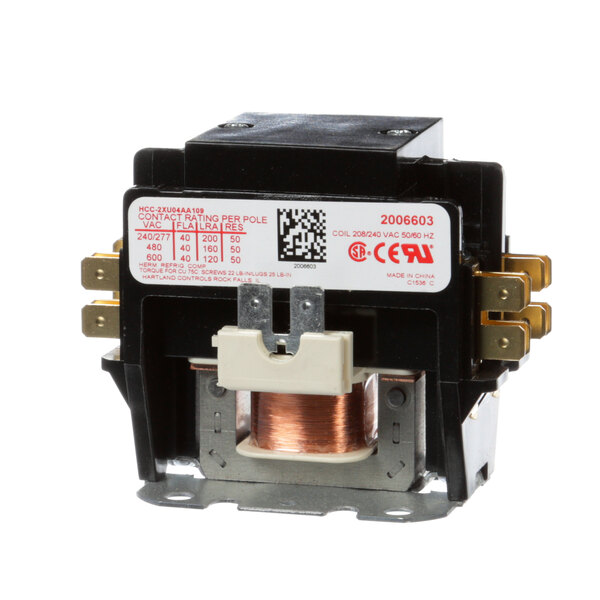 A small black and silver Manitowoc Ice contactor with copper connections and a white label.