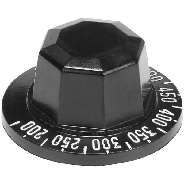 A black plastic knob with white text on a hexagon shape.