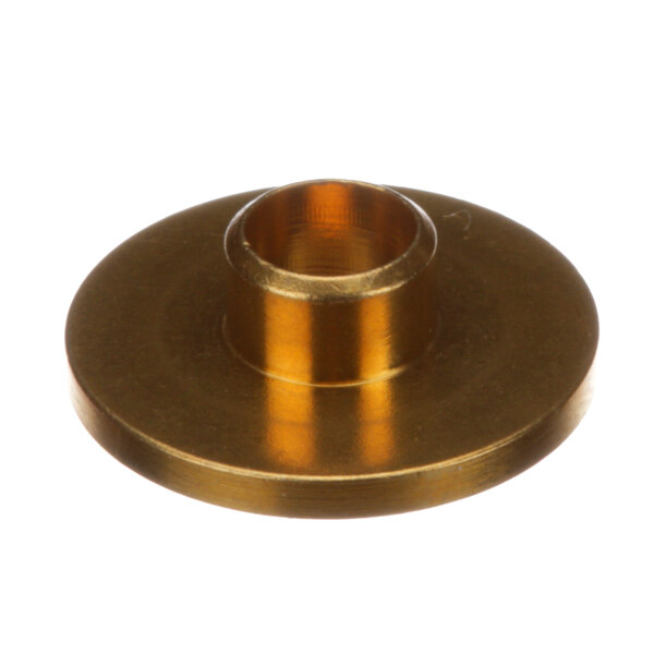 A Franke brass washer with a hole in it.