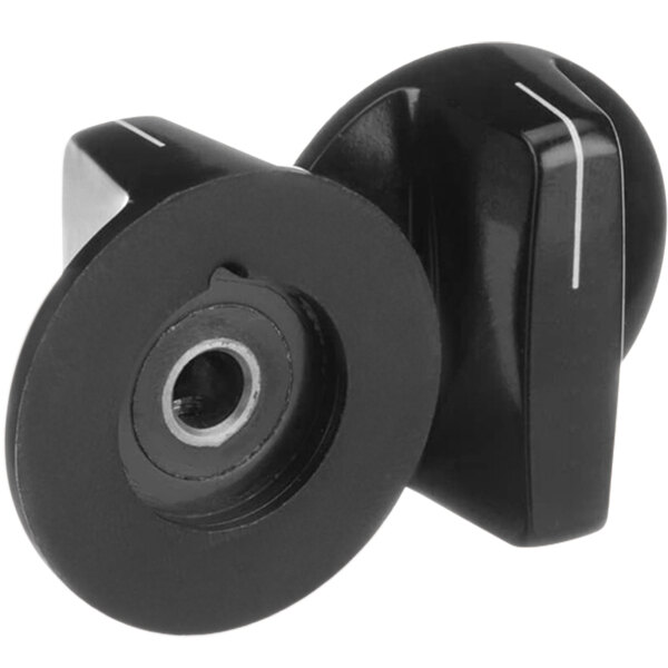 A close up of two black circular knobs.