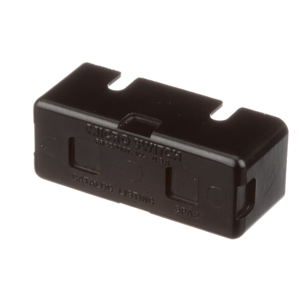 A black rectangular SaniServ switch enclosure with text on the lid.