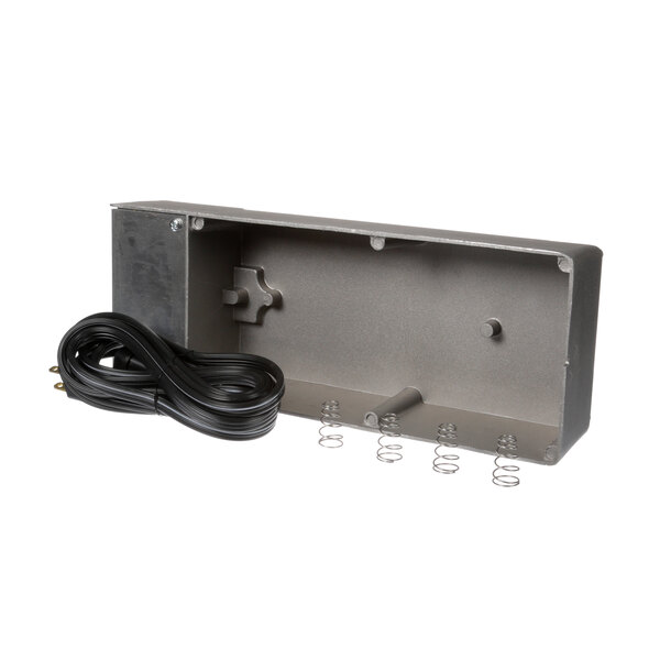 A metal box with a black wire and a power cord.