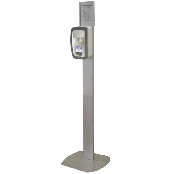 A grey rectangular Kutol Health Guard hand sanitizer stand with a rectangular sign and a metal pole.