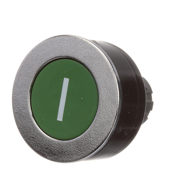 A round green button with a white line on a metal base.
