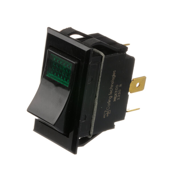 A black Pitco rocker switch with a green light.