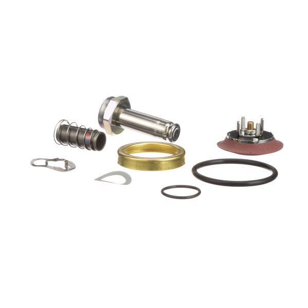 A Stero 0P-542821 piston valve repair kit for a steam safety relief valve on a table.