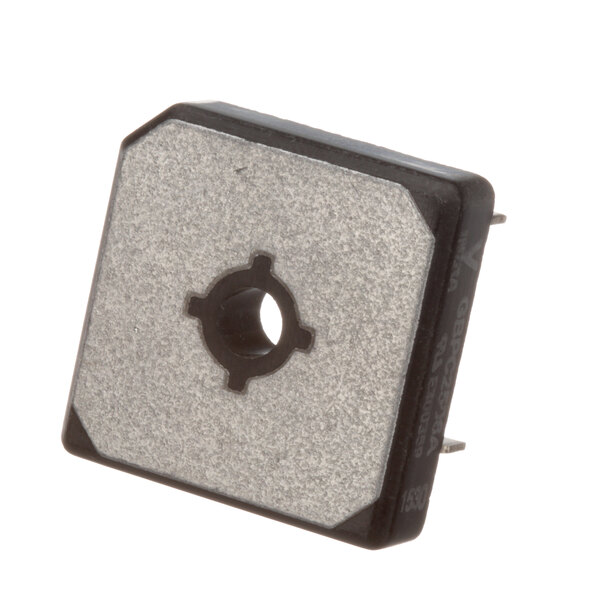 A small black square Cleveland bearing rectifier with a hole in the center.