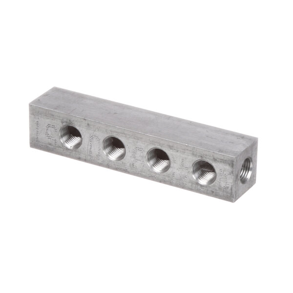 A stainless steel US Range pilot block with four holes.