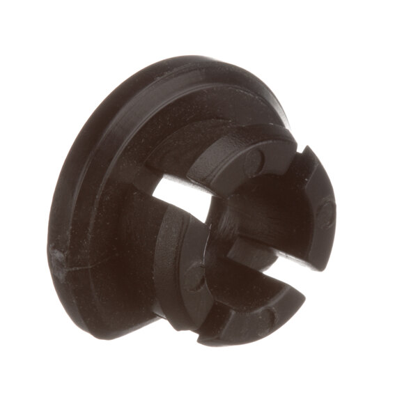A black plastic Master-Bilt hinge pin bushing with a hole.