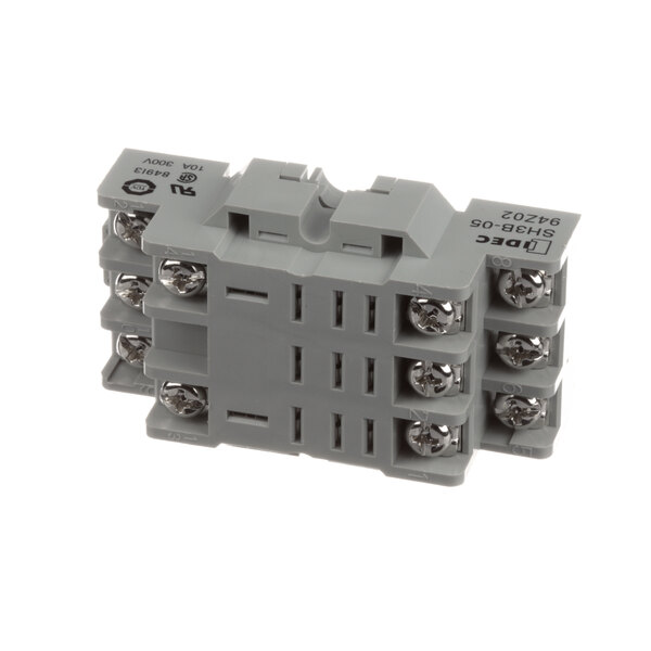 A group of grey Champion electrical connectors with four terminals.