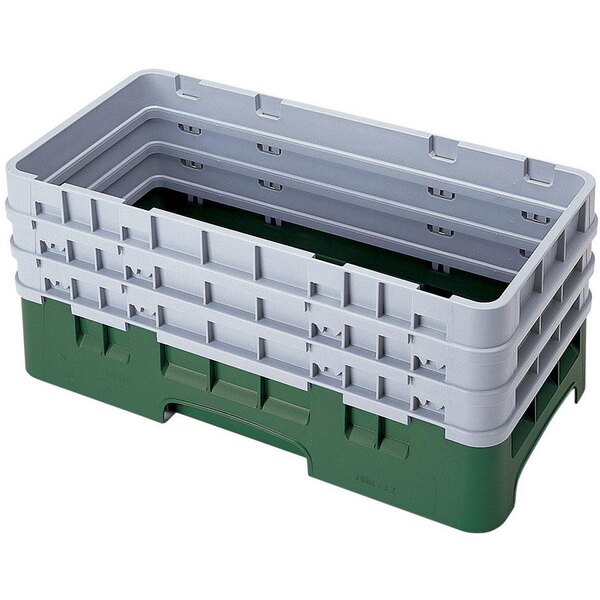 A white plastic Cambro storage rack with green accents and several layers.