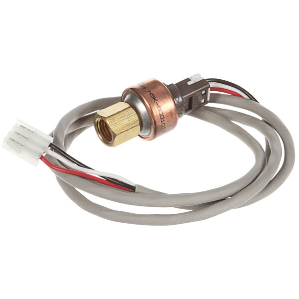 A Delfield pressure transducer with a cable and copper connector.