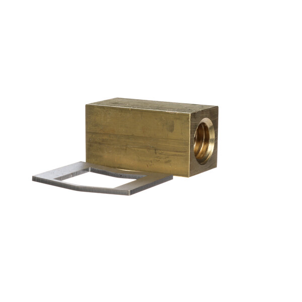 A metal block with a hole for a brass square-shaped nut assembly.