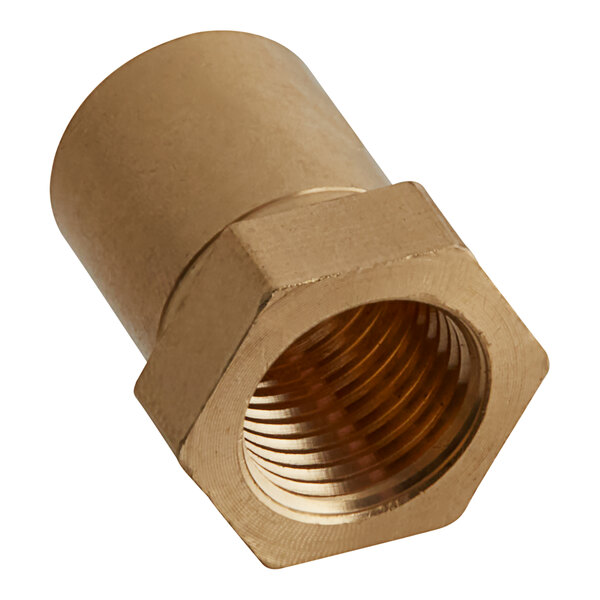 A brass threaded nut on a gold metal pipe.