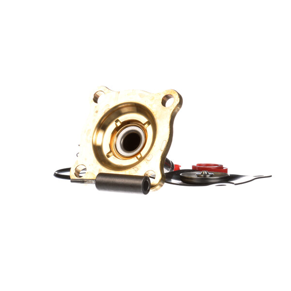 A gold metal Cleveland rebuild kit with a red and black wire.