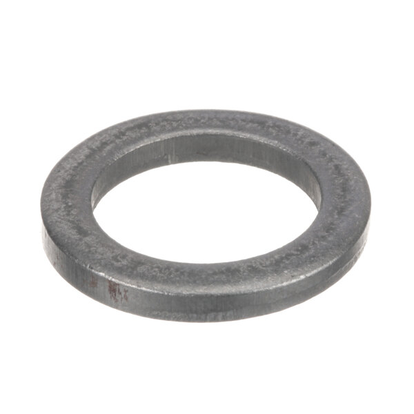 A close-up of a black rubber washer with a metal ring.