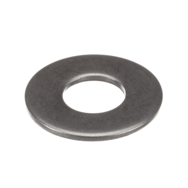 A close-up of a stainless steel flat washer with a black surface.