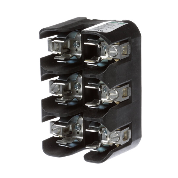 A black Middleby Marshall fuse holder with metal connectors on four terminals.