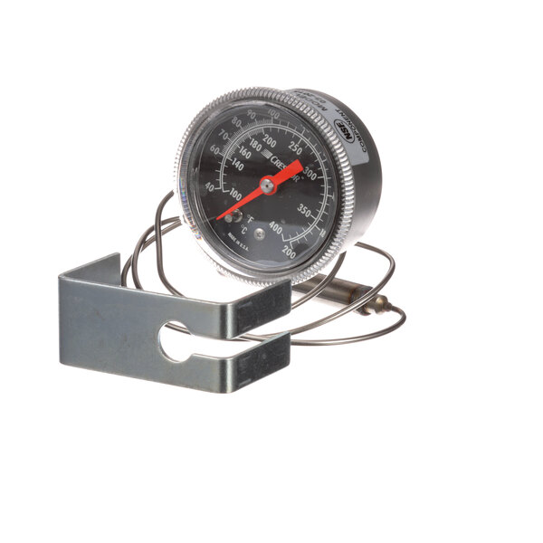 A Cres Cor thermometer gauge with a wire attached.