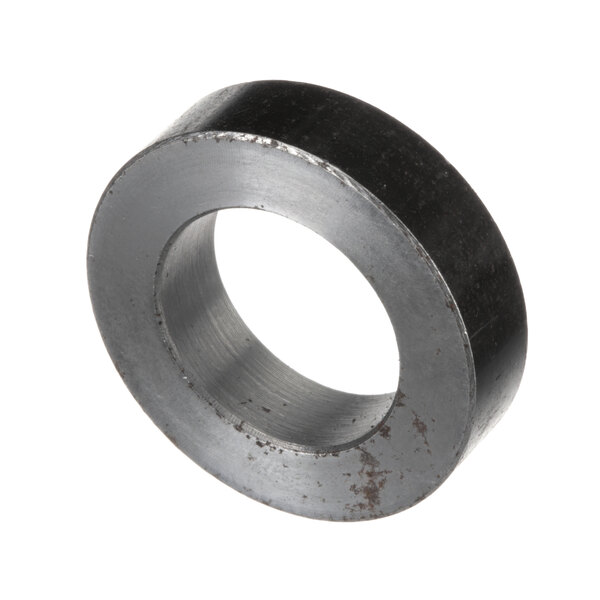 A black steel Cleveland Spacer Thrust Bearing with a hole in it.