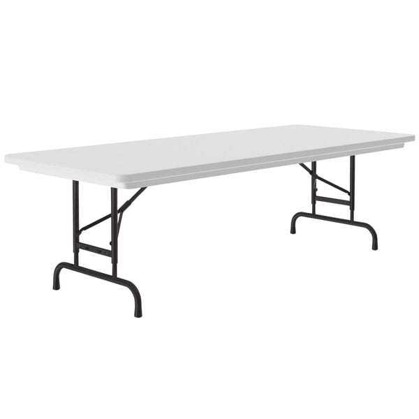 A granite gray rectangular Correll folding table with black legs.