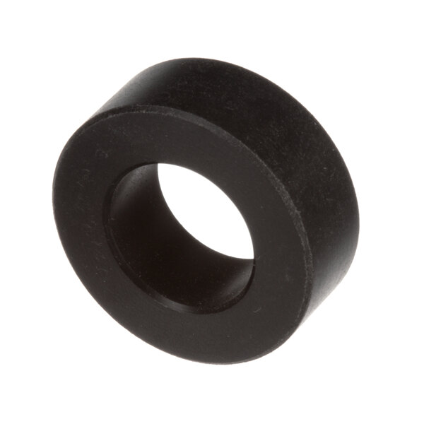 A close-up of a black circular support roller.