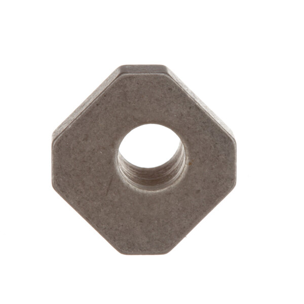 A close-up of a hexagon with a hole in it.