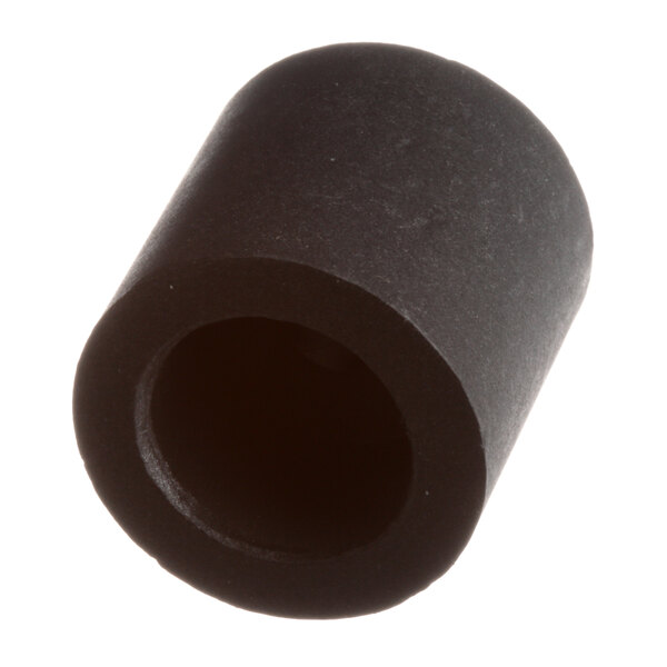 A close-up of a black tube with a hole in it.