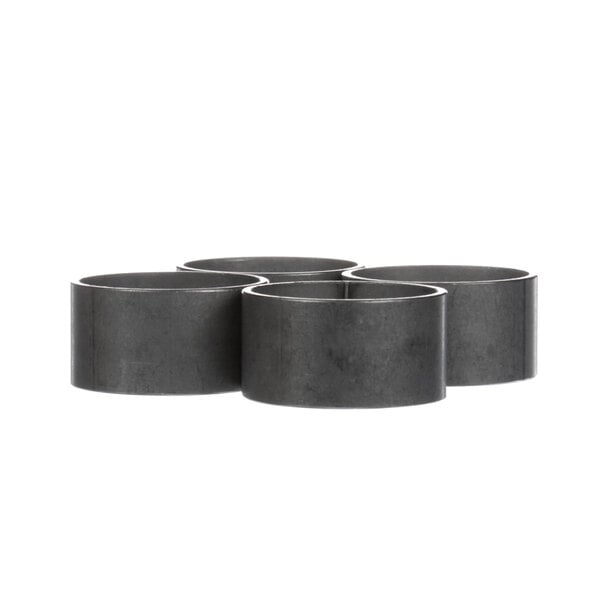 A group of black metal cylinder bearings.
