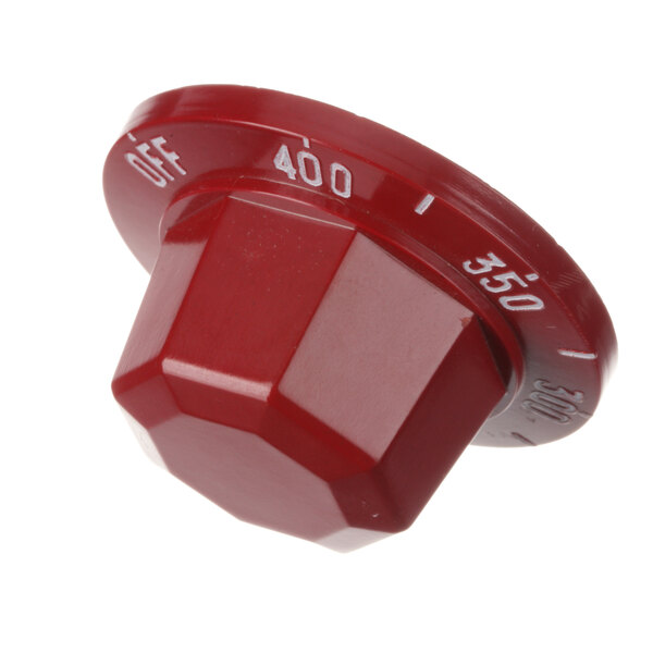 A red Vulcan thermostat knob with numbers on a white background.