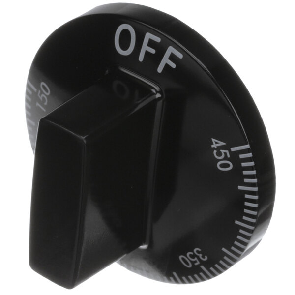 A black dial with white text for a Vulcan thermostat knob.