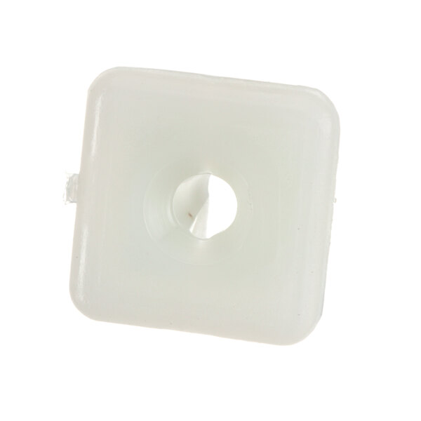 A white square plastic Victory insert with a hole in it.