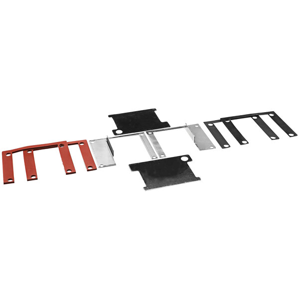 A group of metal parts including a black rectangular object with red and black strips.