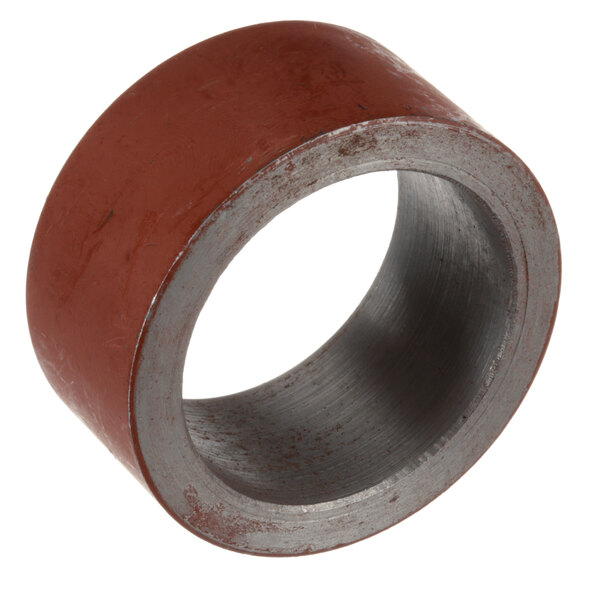 A round metal Cleveland steam trunnion spacer with a red rubber band.