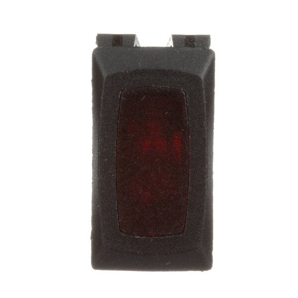 A black rectangular object with a red light.